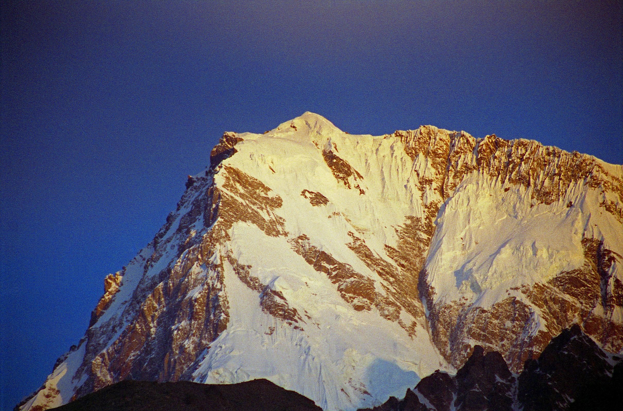 07 Nanga Parbat Rupal And East Faces Close Up From Tarashing At Sunrise Nanga Parbat is a great sunrise mountain viewed from the east at Tarashing. Here is a close up of the Nanga Parbat Rupal and East Faces at sunrise.